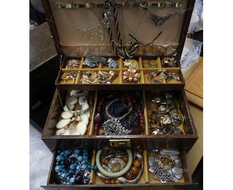 A large jewellery box full of vintage costume jewellery to include Damascene, Marcasite, necklaces, Jewelcraft scales bracele