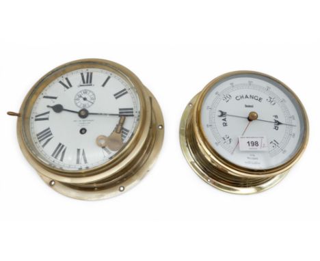 A Kelvin Bottomley &amp; Baird Ltd, Glasgow ships clock together with an English marine barometer Condition Report:Available 