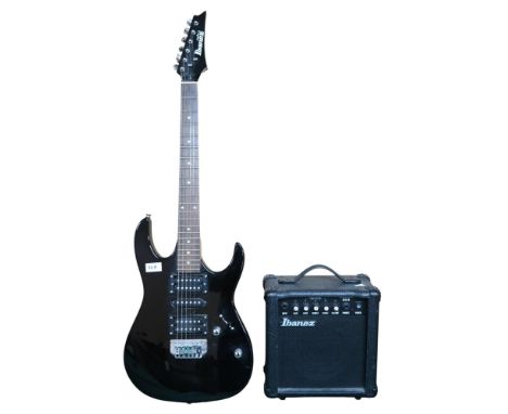 An Ibanez Gio GRX70 double cutaway electric guitar, made in Indonesia, black body, with an Ibanez amp and soft carry case (2)
