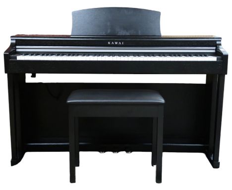 A Kawai CN 23 digital piano and stool in black Condition Report:Available upon request