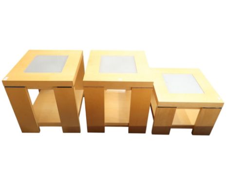 A lot comprising a pair of contemporary teak glass topped lamp tables, 55cm high x 50cm wide x 50cm deep and an accompanying 