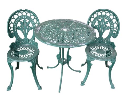 A 20th century cast metal garden table with decoratively pierced circular top on tripod base, 72cm high x 69cm diameter and t