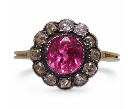 A synthetic ruby and diamond flower cluster ring, set in yellow metal, size Q1/2, weight 2.5gms Condition Report:Available up