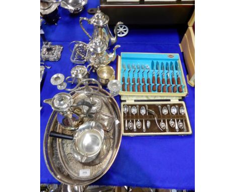 A collection of EPNS including a set of teaspoons, a set of wood-handled cutlery, a four piece tea service, a candelabra, tra