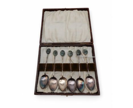 A cased set of Chinese silver teaspoons, with hardstone finials, marked SILVER HONGKONG to reverse, 48gms Condition Report:Av