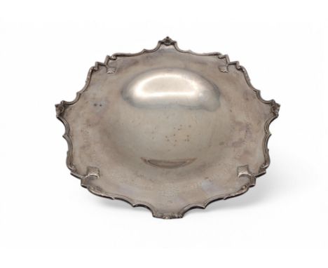 A silver footed dish, by Walker &amp; Hall, Sheffield 1929, with a shaped inverted rim, engraved 'PRESENTED TO OFFICERS A(SCO