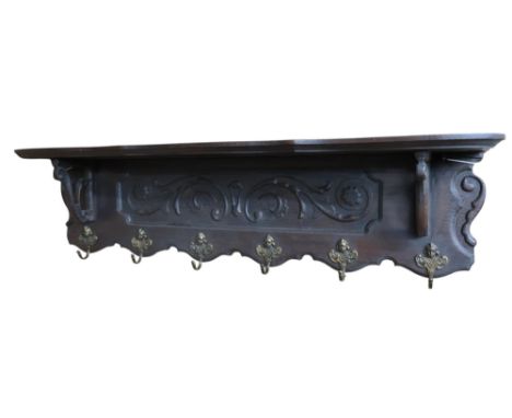 A late 19th century mahogany bevelled glass overmantle mirror, 127cm high x 122cm wide and a 20th century six hook coat shelf