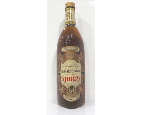 GRANT'S STANDFAST 1960sAn extremely large bottle of the Grant's Standfast Finest Scotch Whisky.  70 Proof.  6 Pints 13 Fl. Oz
