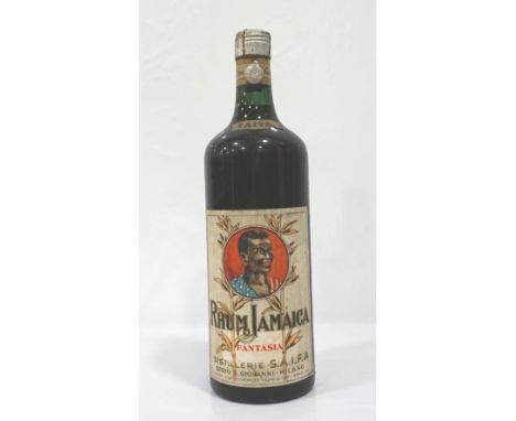 RHUM JAMAICA FANTASIA CIRCA 1930sAn exceptional bottle of vintage rum from 1930s (we estimate) Rhum Jamaica Fantasia by Disti