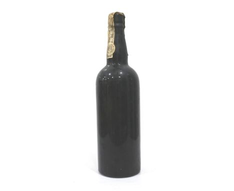 MYSTERY VINTAGE PORTAn older bottle of Vintage Port believed to be from the 1960s, the label has come astray at some point an