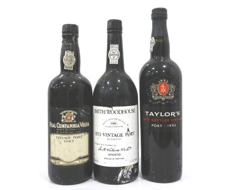SELECTION OF THREE BOTTLES OF PORTcomprising: one SMITH WOODHOUSE & CO 1975 VINTAGE PORT, 75cl, 20% abv; one REAL COMPANHIA V