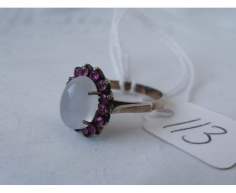 Unusual gold mounted moonstone and  garnet ring approx size 'K'      