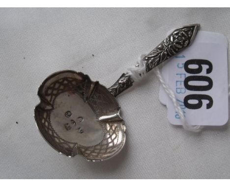 Fancy Georgian caddy spoon with floral  embossed handle 1822 by JW     