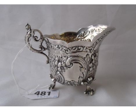 Victorian small cream jug with embossed sides  and on bracket feet 4” over handle Lon 1896 90g   