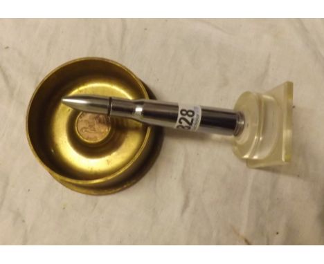 Brass shell case ashtray and a chrome  bullet cigarette lighter       
