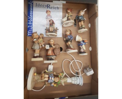 A collection of 7 Goebel figures together with a Goebel figural table lamp and a Goebel brochure (1 tray). 