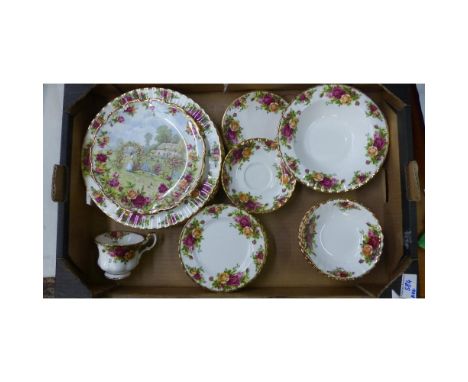 A Collection of Royal Albert Old Country Roses Teaware to include Dinner Plates, Bowls, Side Plates, Saucers, Placemat (1 Tra