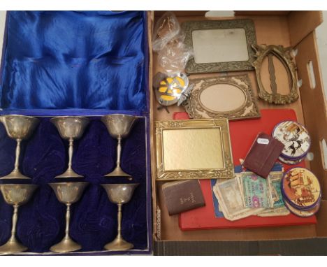 A mixed collection of items to include a set of 6 cased silver plated goblets, album of World stamps, Art Nouveau brass photo