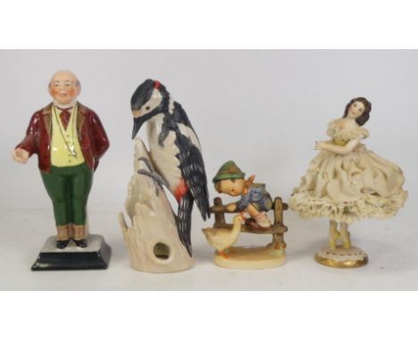 Four Ceramic Figures to include Goebel Woodpecker and a Hummel Child, Royal Harvey Mr. Pickwick and a continental lace figure
