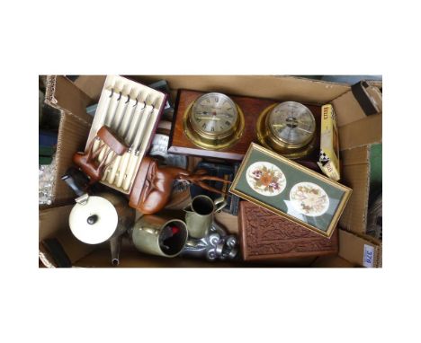 A mixed collection of items to include carved wooden box, wall hanging barometers, carved wooden animal figures, silver plate