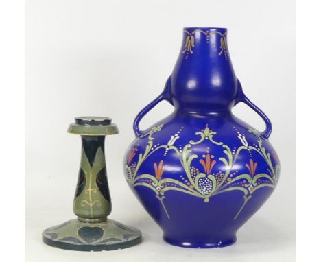 An Art Nouveau Wardle Pottery Candlestick together with an Art Nouveau Vase likely Harry Rhead. Chips noted to candlestick. (