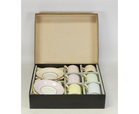 Boxed set of coffee cans &amp; saucers by Royal Chelsea. 