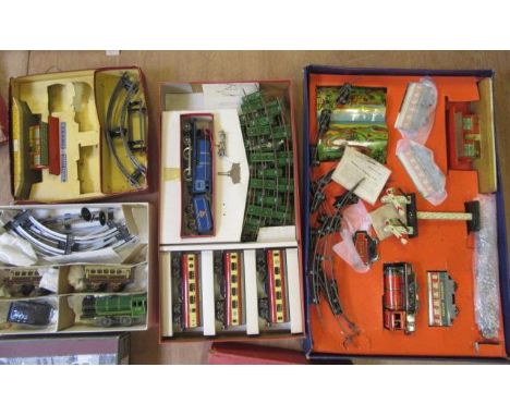 Three clockwork train sets by Mettoy and Chad Valley, and an empty Brimtoy box, G-F (Est. plus 21% premium inc. VAT)