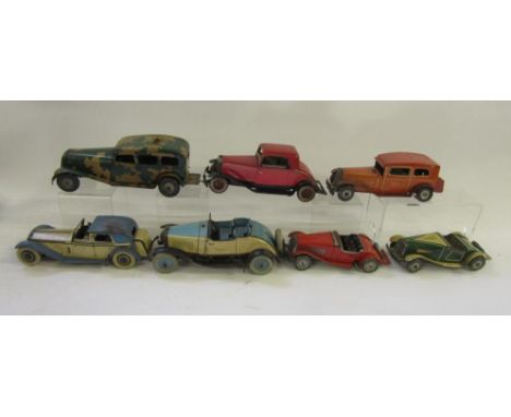 Seven tinplate cars, all clockwork, comprising three Mettoy, two Chad Valley and two other British made models, 8" to 9 1/2" 