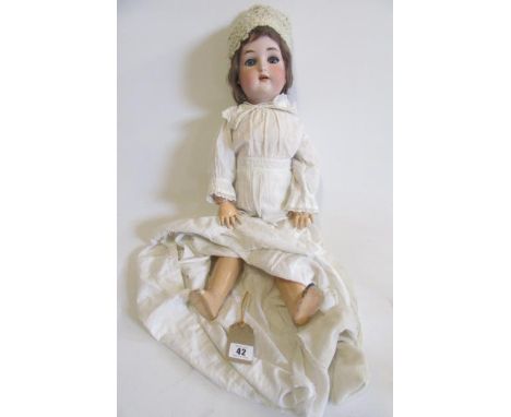 A Simon &amp; Halbig K&amp;R bisque socket head doll, with blue sleeping glass eyes, open mouth and teeth, pierced ears, mous