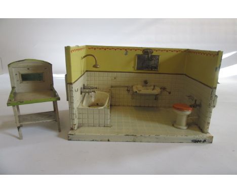 A German tinplate bathroom with bath, basin and W.C., plumbing for taps, and shower, 13" wide, and a tinplate two tier washst