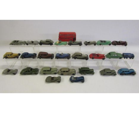 Twenty six older Dinky models, including some pre-war, comprising mainly cars and sports cars playworn (Est. plus 21% premium