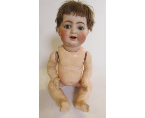 A Kammer &amp; Reinhardt bisque head character Mamma doll, with blue glass flirty eyes, open mouth, trembling tongue, brown m