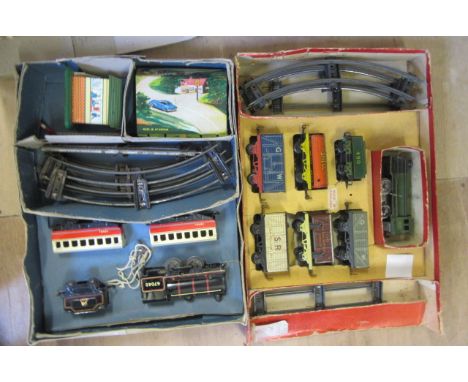 Mettoy Clockwork Train Set with 0-4-0 locomotive and five goods trucks, box AF, F, a Chad Valley Clockwork Train Set with B.R