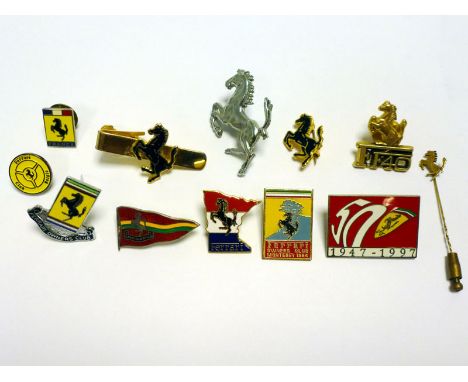 Ferrari Ephemera  A good varied lot, to include a hallmarked silver lapel badge, four gold-plated button-hole badges, Ferrari