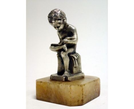 The Study' Accessory Mascot  Depicting a young nude male studying a book, in a seated position, using his robes as a cushion.