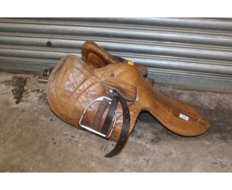 A VINTAGE LEATHER HORSE RACING SADDLE