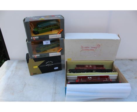 THREE BOXED CORGI DIECAST BUSES TOGETHER WITH TWO SCRATCH BUILT O GAUGE MODEL RAILWAY CARRIAGES 