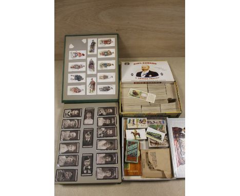A FOLDER OF VINTAGE CIGARETTE CARDS, TOGETHER WITH TWO BOXES OF LOOSE CIGARETTE CARDS AND TEA CARDS