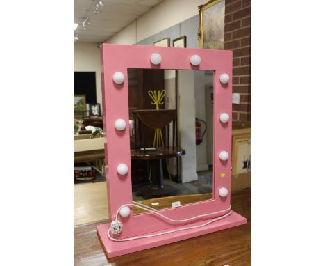 A MODERN PINK LIGHT UP  VANITY MIRROR  H-82.5CM  W-68CM