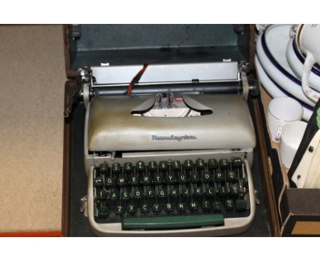 A CASED VINTAGE REMINGTON TYPEWRITER