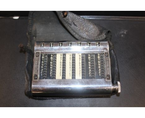 A VINTAGE GEM ADDING MACHINE IN ORIGINAL CASE