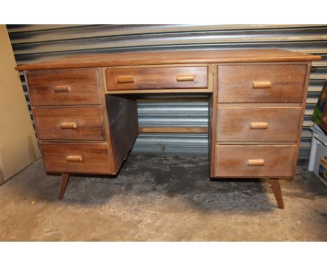 A VINTAGE OAK SEVEN DRAWER DESK - W 123 CM, H 72 CM, D 60.5 M