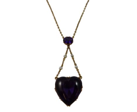 A Victorian rose gold, amethyst and seed pearl necklace, circa 1880, the claw set cabochon heart shape amethyst, with faceted