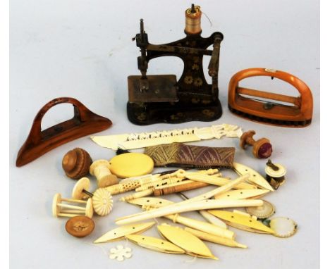 A quantity of Victorian and Edwardian sewing and other accessories, in ivory, bone, wood, mother of pearl and vegetable ivory