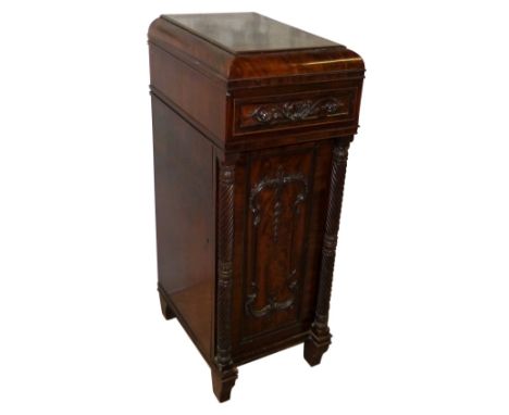 A William IV mahogany tall and narrow cupboard,  formerly a sideboard pedestal, with caddy top over a single drawer with carv