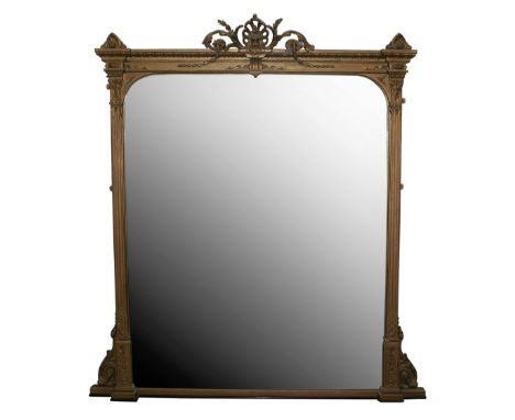 A 19th century gilt framed overmantle mirror of slightly inverted breakfront form, the moulded cornice with applied pierced a