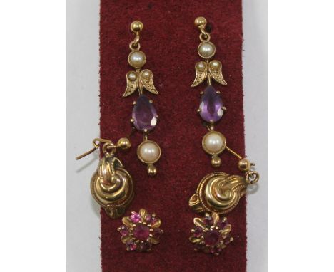 A 9ct gold pair of amethyst and half pearl ear pendants, a pair of garnet cluster ear studs and a pair of gold ear rings (3).