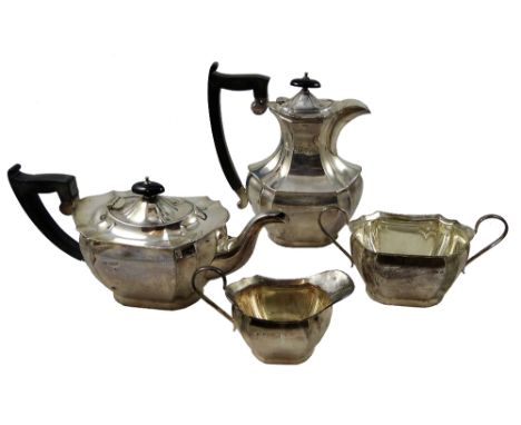 A four piece tea and coffee service, by Viners, Sheffield 1956, of oval panelled baluster form, comprising, tea pot, hot wate