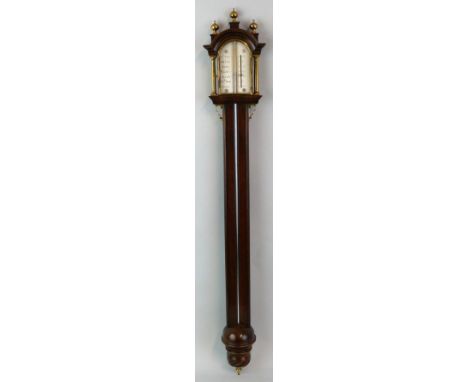 Garner & Marney Ltd. - a George III style red walnut and brass stick barometer, circa 1980, the silvered dial flanked by bras