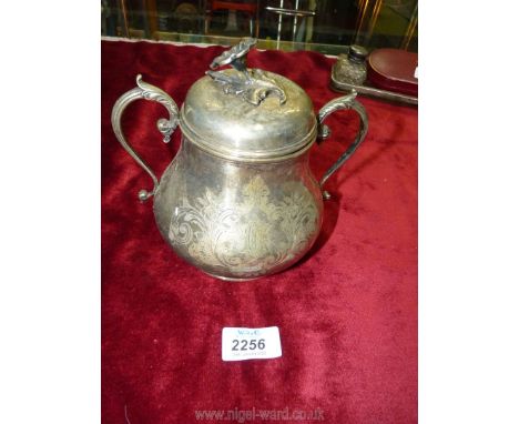A plated double handled, lidded sugar caddy with floral finial to lid, stamped 9320 to base.